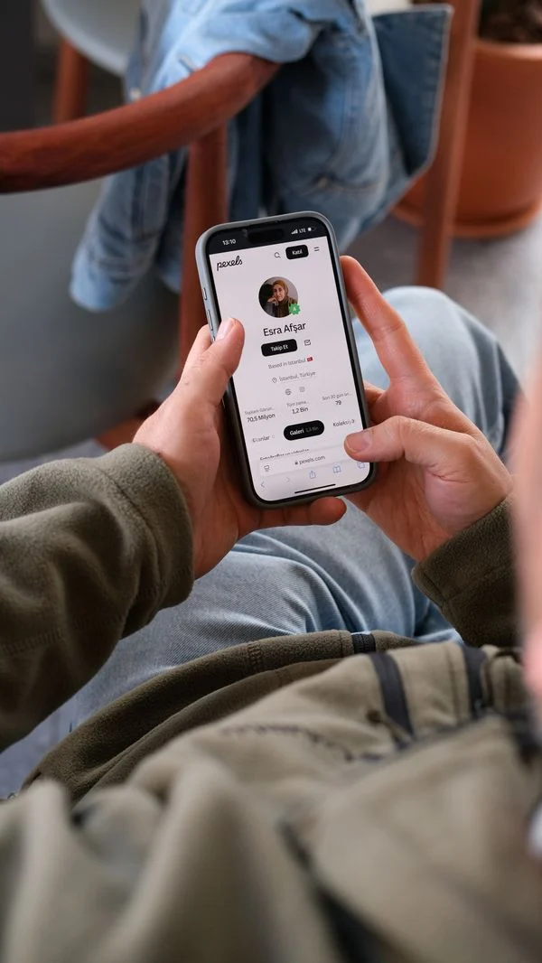 App Stores Work Flathub - Person using apps on a smartphone